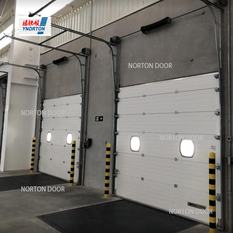 How do industrial insulated doors achieve their insulation effect?